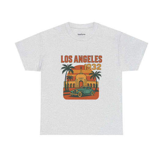 Vintage Los Angeles 1932 Olympics t-shirt featuring the LA Memorial Coliseum, palm trees, and a retro car design on a ash tee